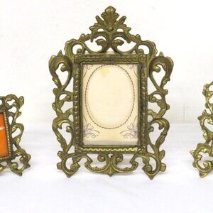 This Antique Victorian Rococo Brass Cast Metal Easel Picture Frame is a stunning